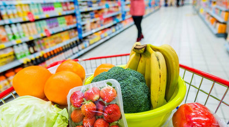shopping cart full of vegetables fruit produce