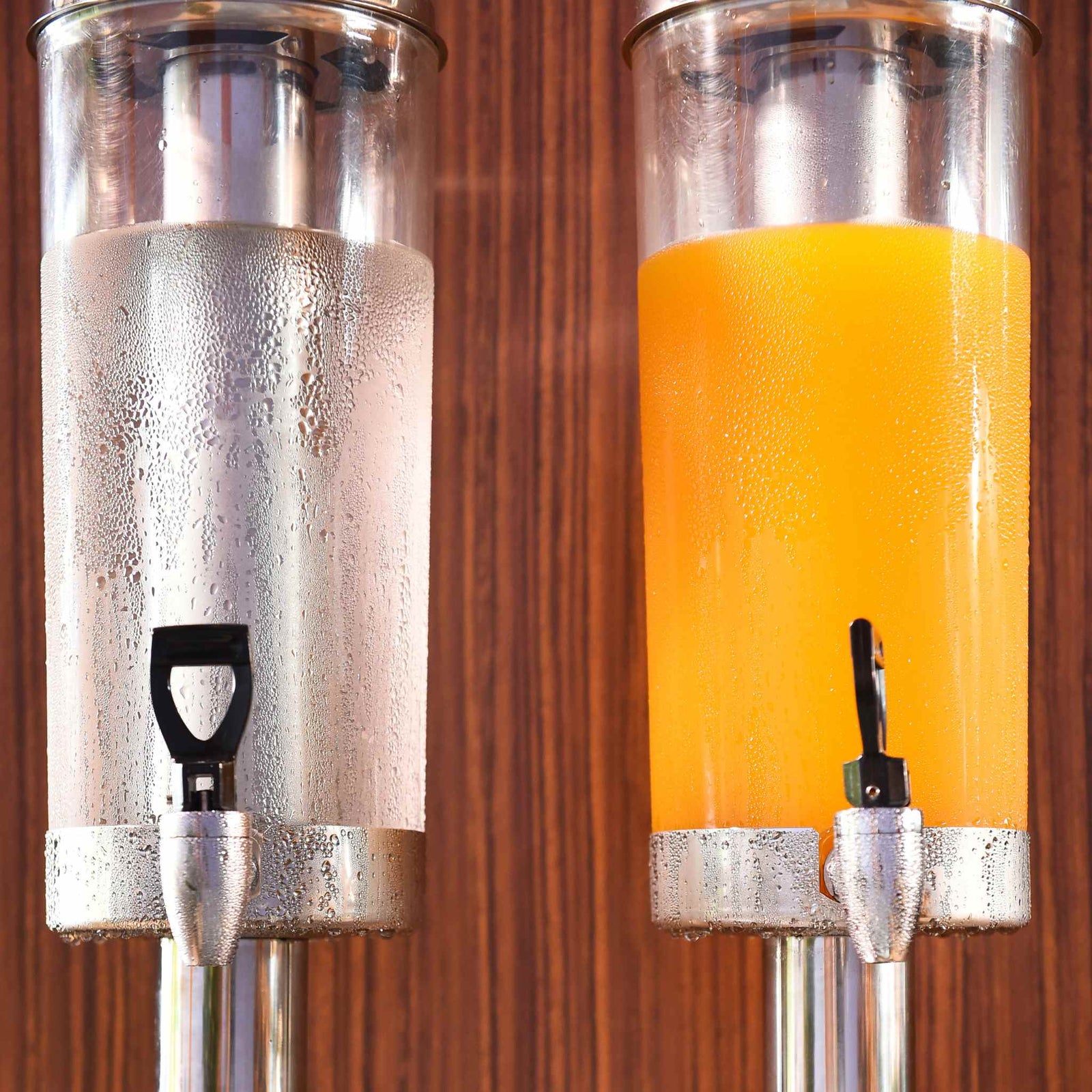 dispensers of water and orange juice