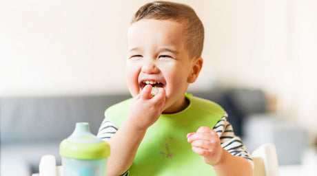 happy toddler eating