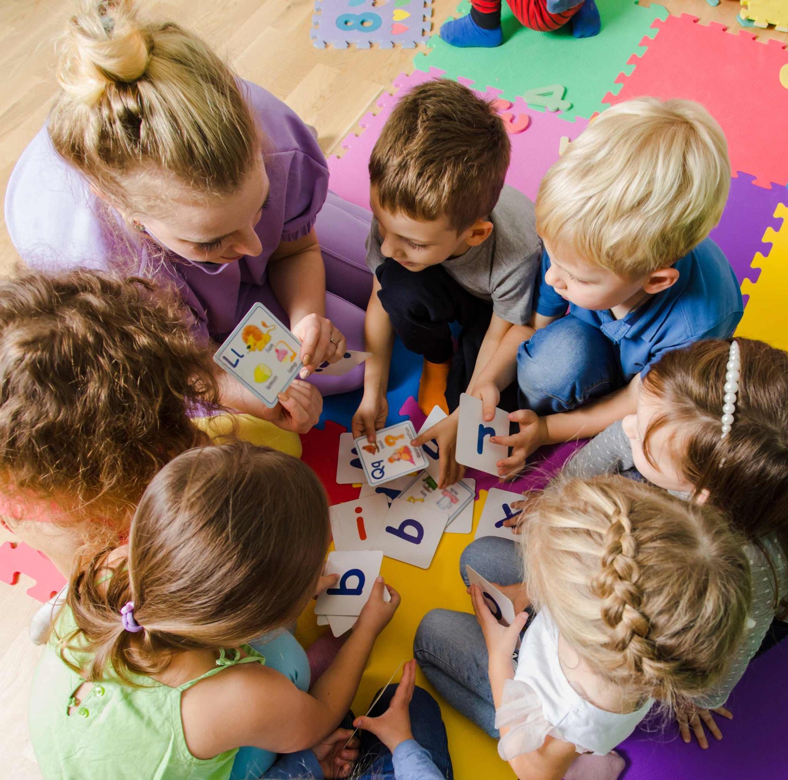 kids and teacher in daycare setting