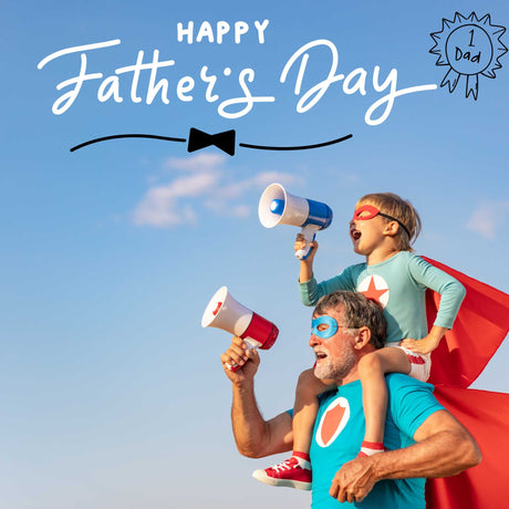 Happy Father's Day on image of dad and son dressed up as superheros