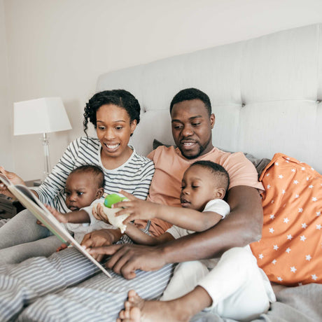 family reading together before bedtime