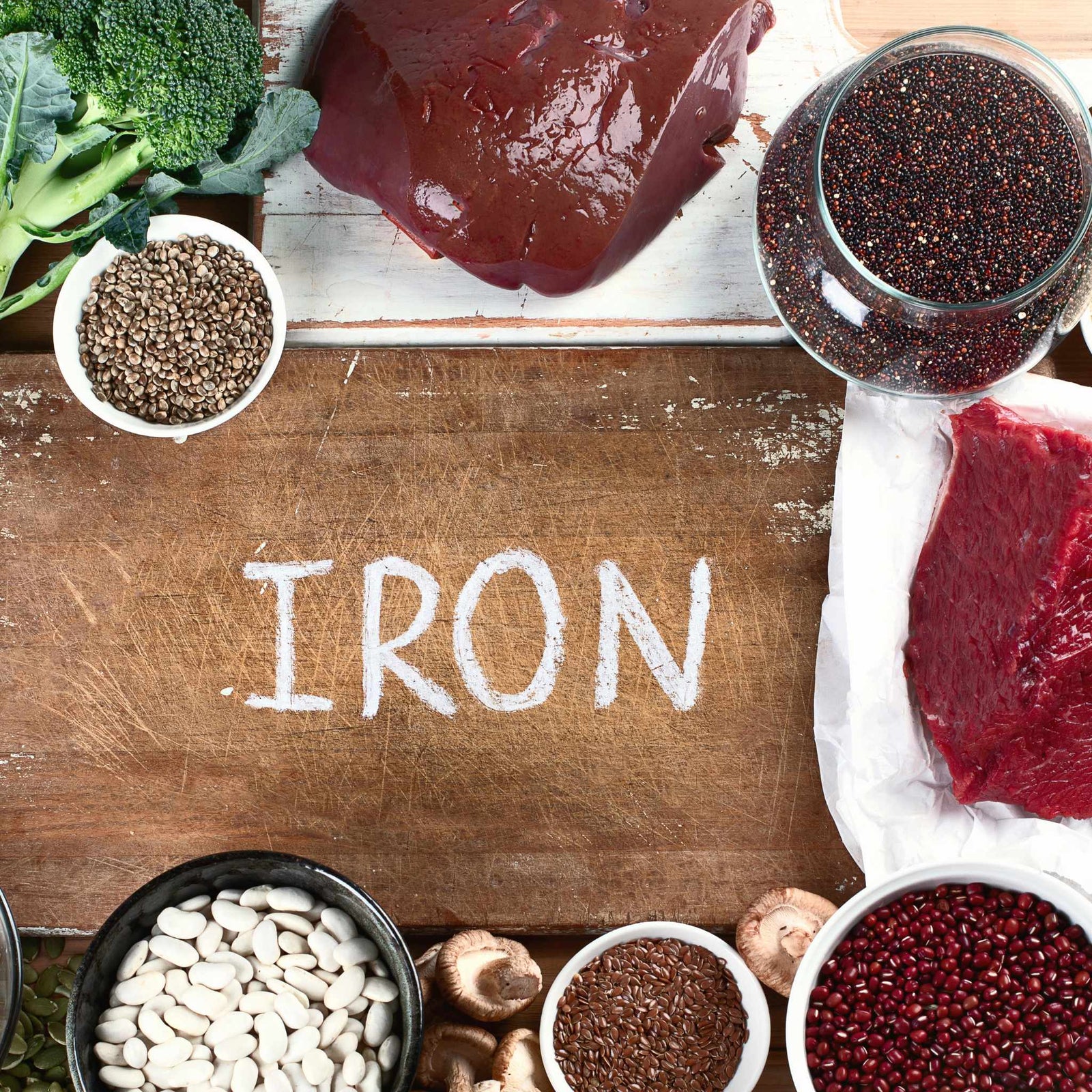 The word IRON surrounded by iron-containing foods