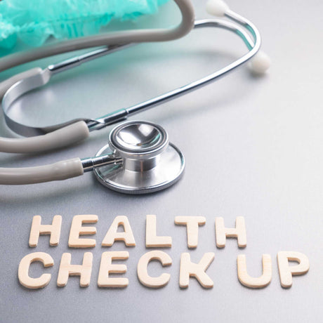 Health Check Up next to stethoscope 