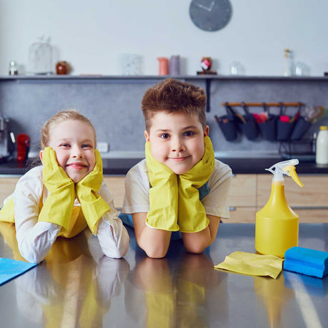 kids with cleaning gloves on