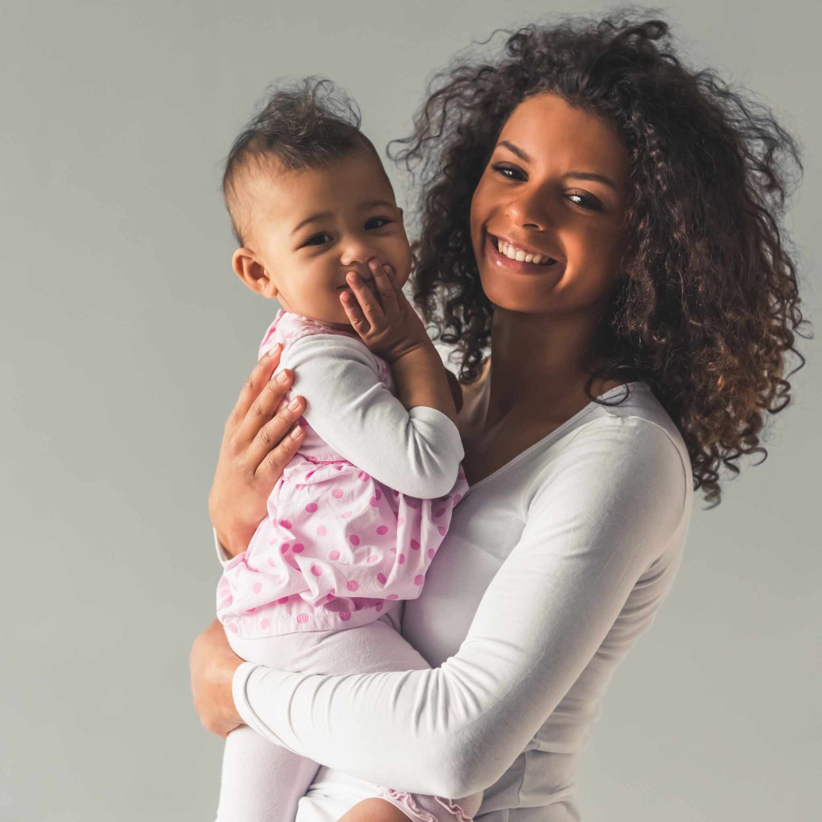 mom and baby smiling