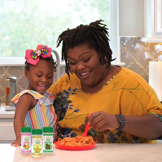 mom and daughter enjoying spaghetti with Easy Peasie veggie powder blends