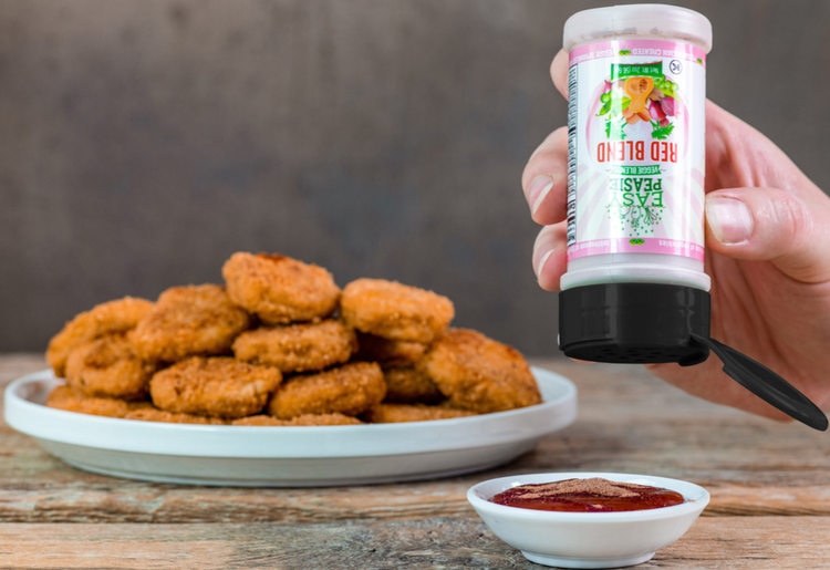 Sprinkle Easy Peasie veggie powder blends into chicken nugget sauce for picky eaters